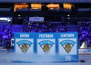 HELSINKI, FINLAND - DECEMBER 26: Former Finnish national team members Saku Koivu #11, Ville Peltonen #16 and Jere Lehtinen #26 have their numbers retired during a on-ice ceremony at the 2016 IIHF World Junior Championship. (Photo by Andre Ringuette/HHOF-IIHF Images)


