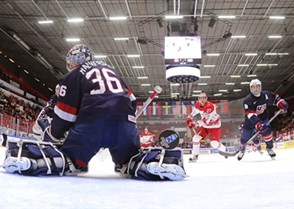 HELSINKI, FINLAND - DECEMBER 30: USA's Brandon Halverson #36 turns as Team Denmark scores a first period goal with Louis Belpedio #8 and Denmark's Alexander True #27 in front during preliminary round action at the 2016 IIHF World Junior Championship. (Photo by Matt Zambonin/HHOF-IIHF Images)


