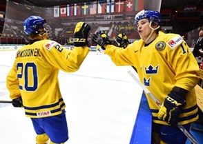 HELSINKI, FINLAND - JANUARY 2: Sweden's Joel Eriksson Ek #20 high fives Sweden's Dmytro Timashov #17 after scoring a first period goal during quarterfinal round action at the 2016 IIHF World Junior Championship. (Photo by Matt Zambonin/HHOF-IIHF Images)

