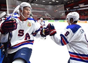 HELSINKI, FINLAND - JANUARY 2: USA's Nick Schmaltz #9 high fives the bench after scoring Team USA's first goal of the game during quarterfinal round action at the 2016 IIHF World Junior Championship. (Photo by Matt Zambonin/HHOF-IIHF Images)

